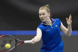 Céline Naef a l'occasion de décrocher un nouveau titre sur le circuit ITF (archives). KEYSTONE/PETER SCHNEIDER